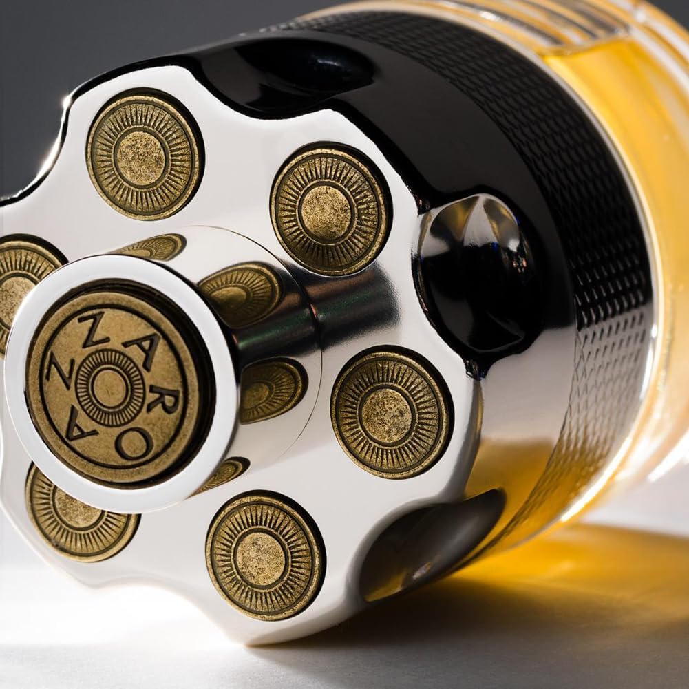 Close-up of a metallic object with circular designs and 'ZARO' branding.