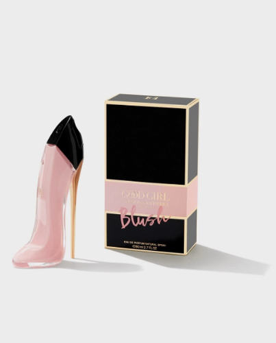 Carolina Herrera Girl Blush perfume bottle with a soft pink tint and a faceted, crystal-like cap.